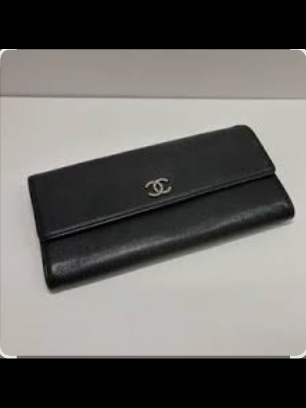 CHANEL Black Leather Flap Wallet with Silver CC Emblem